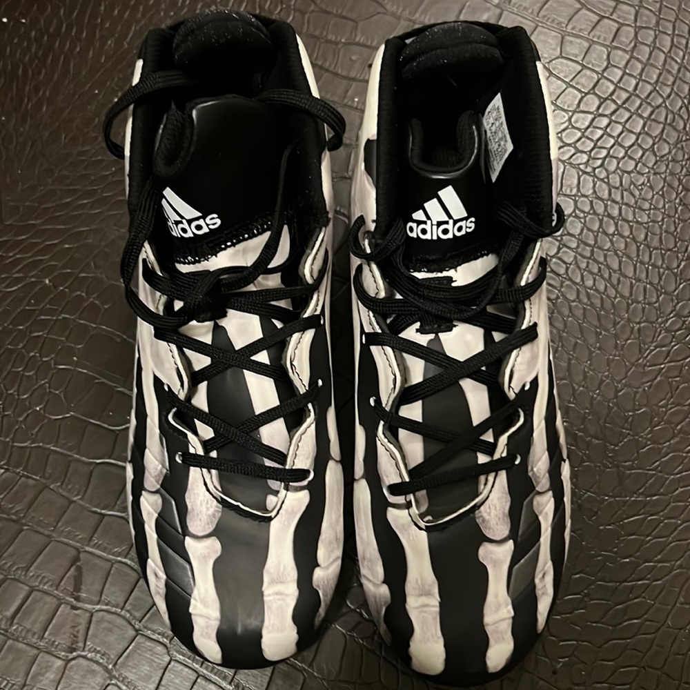 Barely worn (Like new) football cleats glow in the dark